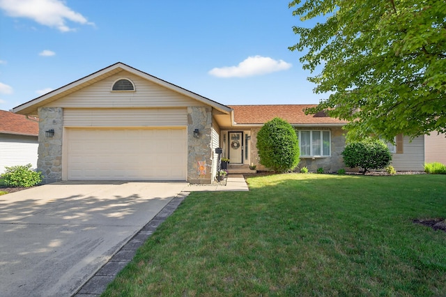 1814 Kingsbury Dr, Saint Marys, OH 45885 - ranch-style house with stone siding, an attached garage, concrete driveway, and a front lawn