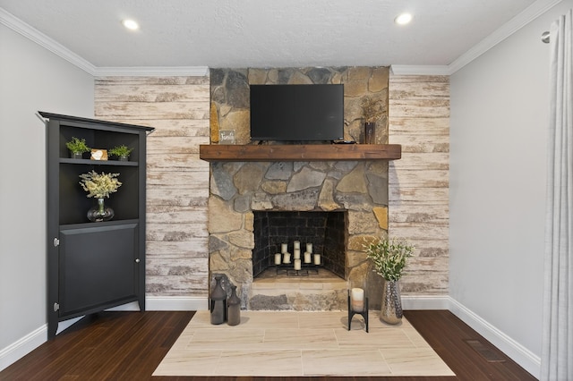 1814 Kingsbury Dr, Saint Marys, OH 45885 - living room with ornamental molding, wood finished floors, a stone fireplace, and recessed lighting