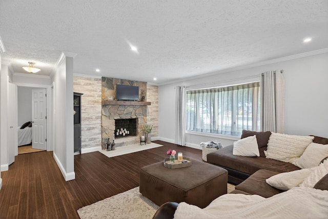 1814 Kingsbury Dr, Saint Marys, OH 45885 - living area with ornamental molding, a textured ceiling, wood finished floors, a stone fireplace, and recessed lighting