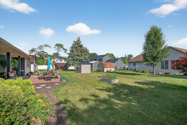 1814 Kingsbury Dr, Saint Marys, OH 45885 - view of yard featuring a storage shed and a patio area