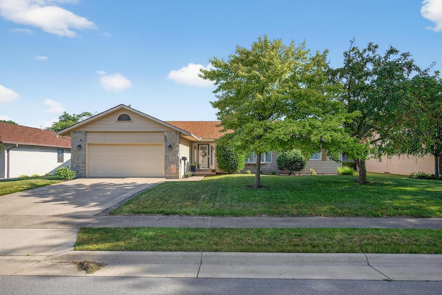 1814 Kingsbury Dr, Saint Marys, OH 45885 - view of front facade with an attached garage, a front lawn, concrete driveway, and stone siding