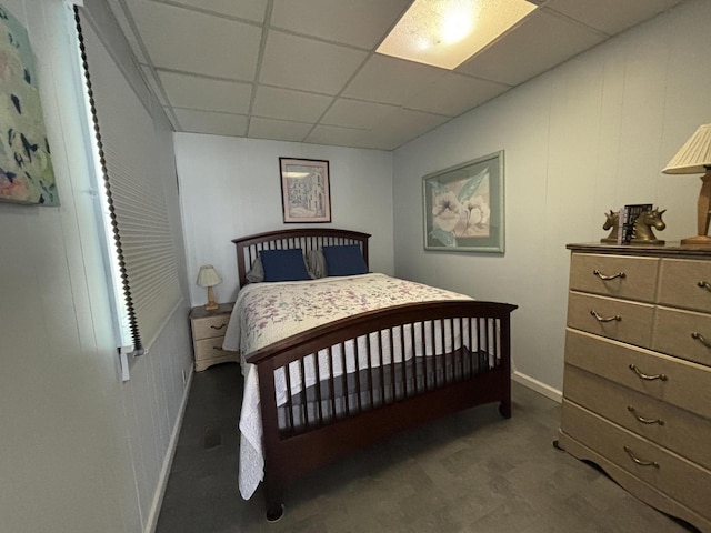 bedroom featuring a paneled ceiling