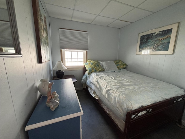 bedroom with a paneled ceiling