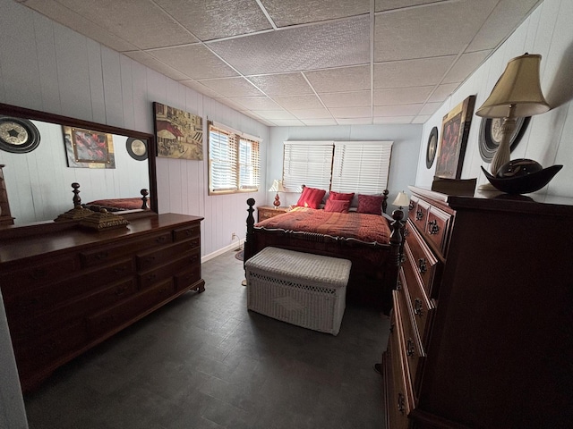 bedroom featuring a paneled ceiling