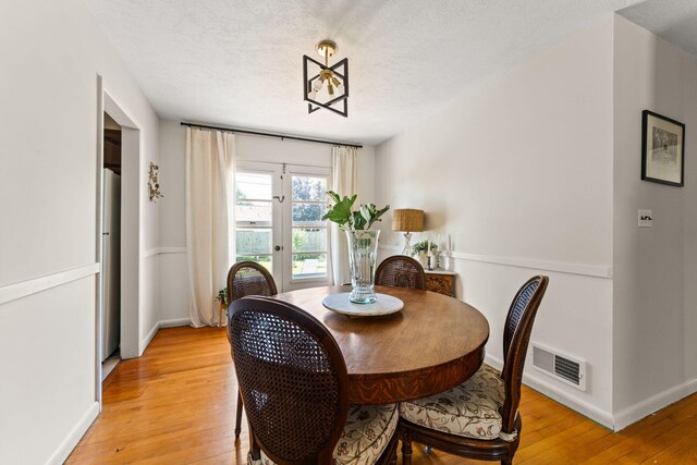 542 Lohnes Dr, Fairborn, OH 45324 - dining area featuring light wood-style flooring and baseboards