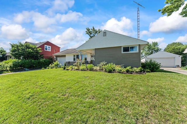 542 Lohnes Dr, Fairborn, OH 45324 - view of front facade featuring a front yard, an attached garage, and a garage