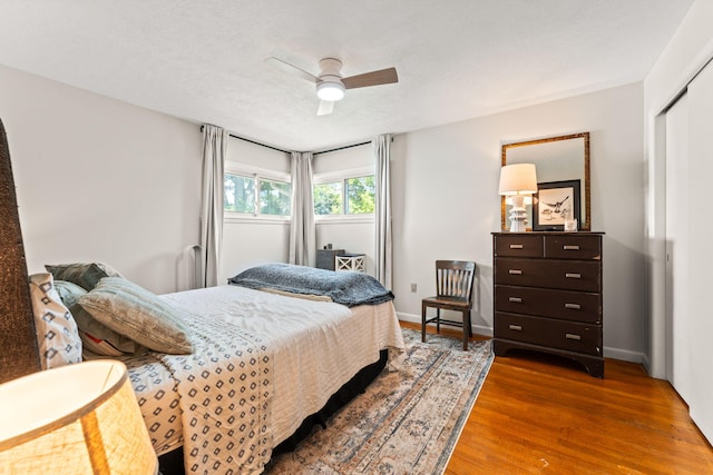 542 Lohnes Dr, Fairborn, OH 45324 - bedroom with wood finished floors, ceiling fan, and a closet