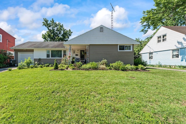 542 Lohnes Dr, Fairborn, OH 45324 - view of front of home featuring a garage and a front yard