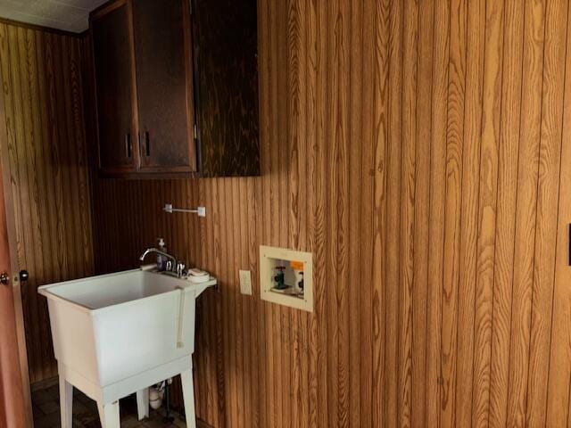 9050 N State Route 49, Greenville, OH 45331 - laundry room with cabinet space, hookup for a washing machine, and wooden walls