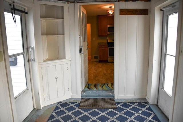 interior space with plenty of natural light and visible vents