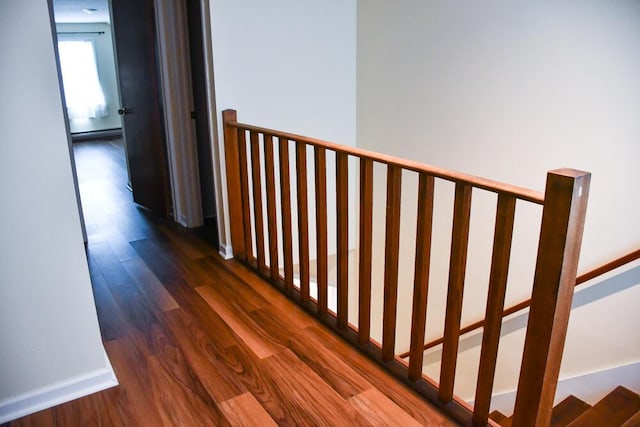 corridor with dark wood finished floors