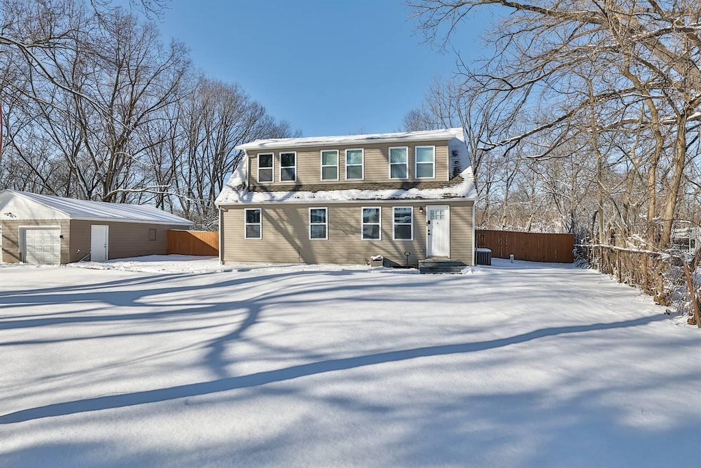 view of front of house featuring an outbuilding and central AC