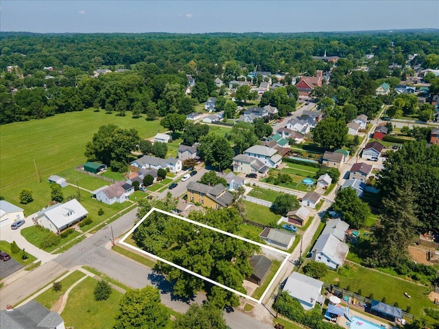 188 S Walnut St, Germantown, OH 45327 - aerial perspective of suburban area with property parcel outlined and a forest