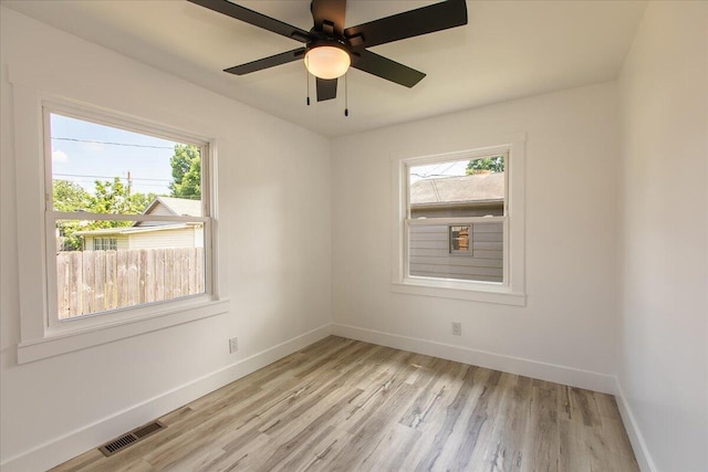 188 S Walnut St, Germantown, OH 45327 - spare room with plenty of natural light, light wood-style flooring, and ceiling fan