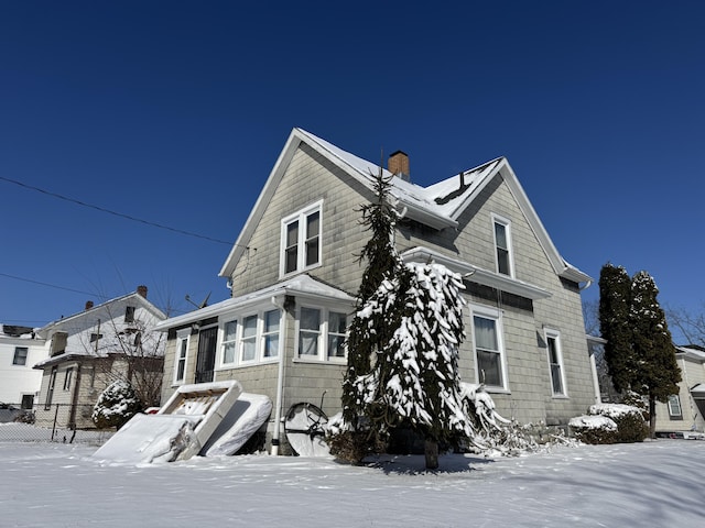 view of snow covered property