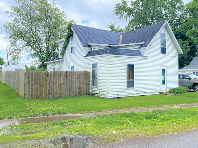 116 N Mill St, De Graff, OH 43318 - view of property exterior featuring a shingled roof
