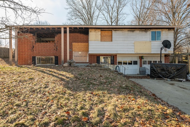 bi-level home featuring a garage