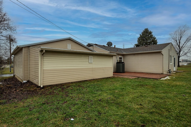 rear view of house with a yard