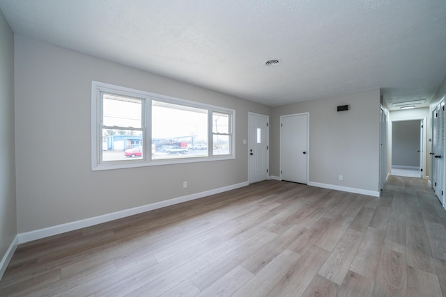 interior space with light hardwood / wood-style flooring