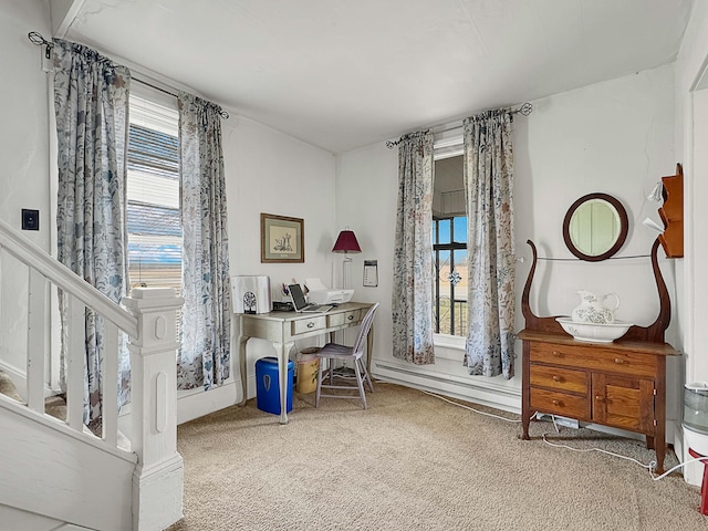 carpeted office featuring a baseboard radiator