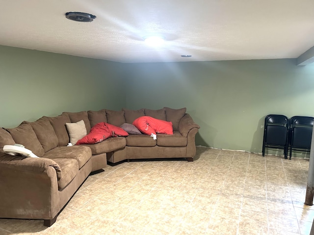 living room featuring a textured ceiling