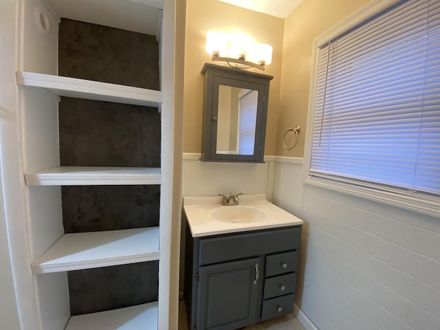 465 Miami St, Piqua, OH 45356 - bathroom with vanity and a wainscoted wall