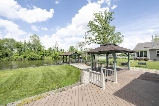 7868 Beech Ave, Russells Point, OH 43348 - wooden deck with a gazebo, a water view, and a lawn