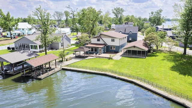 7868 Beech Ave, Russells Point, OH 43348 - dock featuring a residential view, a water view, and boat lift