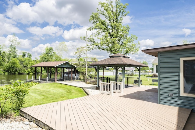 7868 Beech Ave, Russells Point, OH 43348 - wooden terrace with a gazebo, a lawn, and a water view