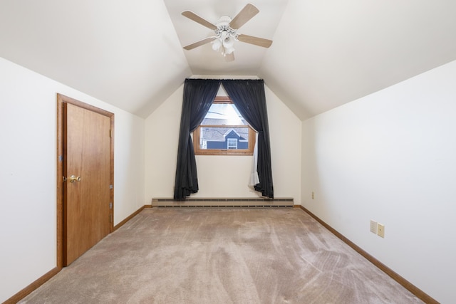 7868 Beech Ave, Russells Point, OH 43348 - bonus room with a baseboard radiator, vaulted ceiling, ceiling fan, carpet floors, and baseboards