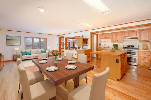 7868 Beech Ave, Russells Point, OH 43348 - dining room featuring light wood-style flooring
