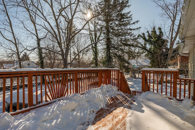 view of snow covered deck