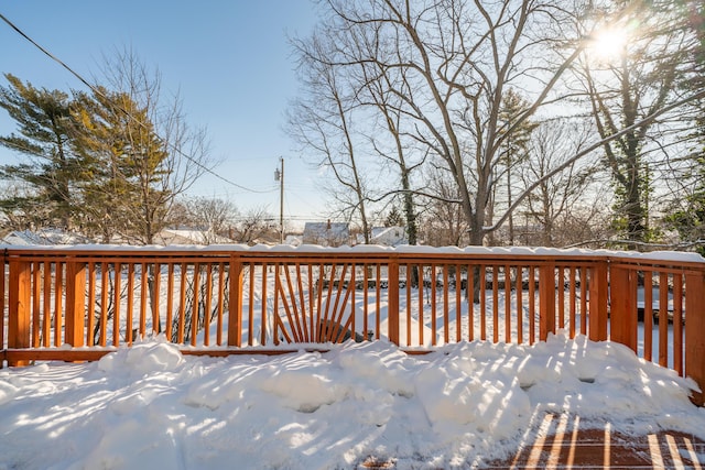 view of snow covered deck