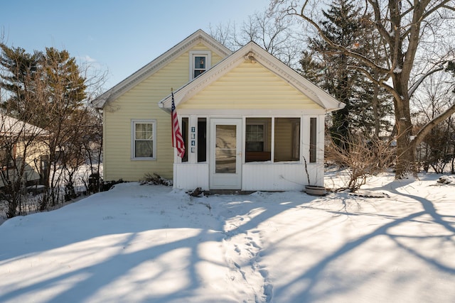 view of snow covered property