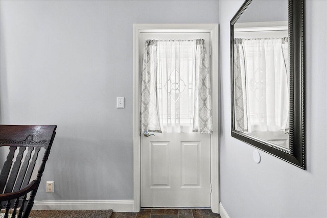402 E Baird St, West Liberty, OH 43357 - doorway featuring baseboards