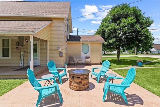 402 E Baird St, West Liberty, OH 43357 - view of patio with an outdoor fire pit