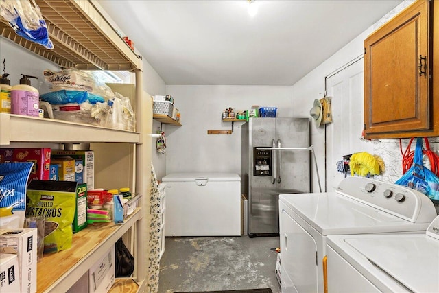 402 E Baird St, West Liberty, OH 43357 - washroom featuring independent washer and dryer and cabinet space