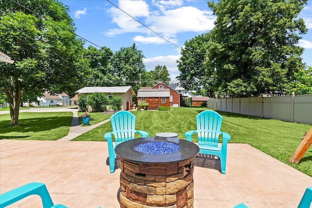 402 E Baird St, West Liberty, OH 43357 - view of patio / terrace with an outdoor fire pit