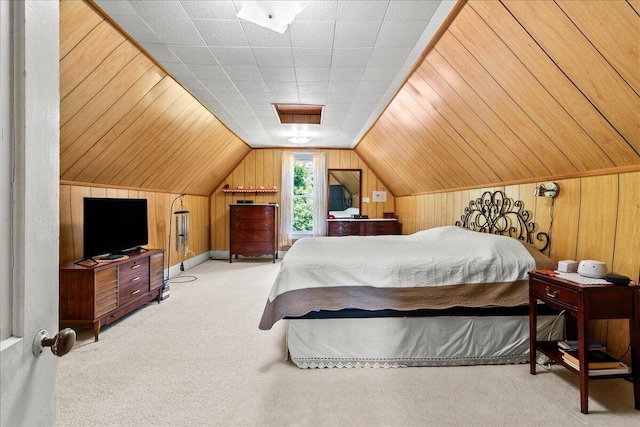 402 E Baird St, West Liberty, OH 43357 - carpeted bedroom featuring wood walls and vaulted ceiling