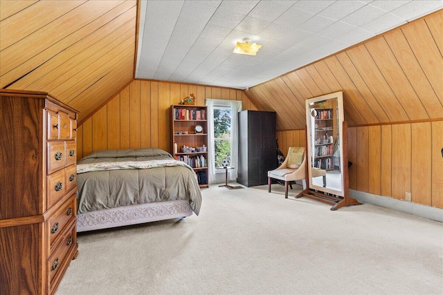 402 E Baird St, West Liberty, OH 43357 - carpeted bedroom featuring wood walls and vaulted ceiling