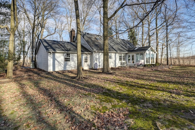 view of front of home with a chimney