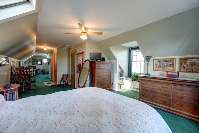 bedroom with lofted ceiling, carpet, and a ceiling fan