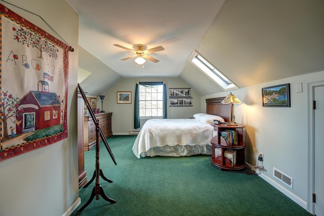 bedroom with a ceiling fan, carpet, visible vents, baseboards, and lofted ceiling with skylight