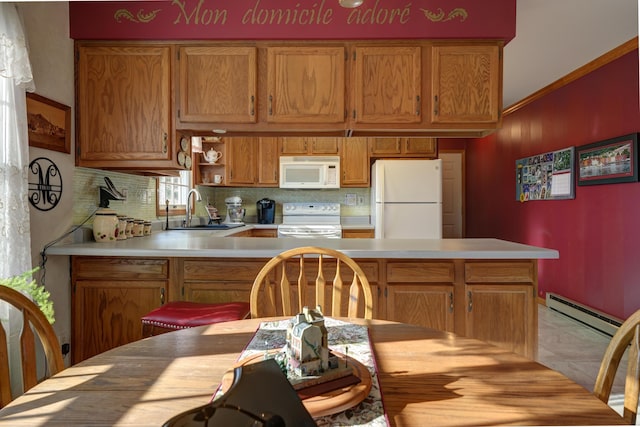 kitchen with brown cabinets, a sink, white appliances, light countertops, and a baseboard radiator