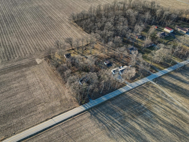 birds eye view of property featuring a rural view