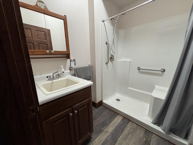4602 State Route 273, Belle Center, OH 43310 - full bath with wood finished floors, a stall shower, and vanity