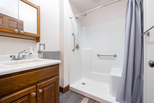 4602 State Route 273, Belle Center, OH 43310 - full bathroom with curtained shower, wood finished floors, and vanity