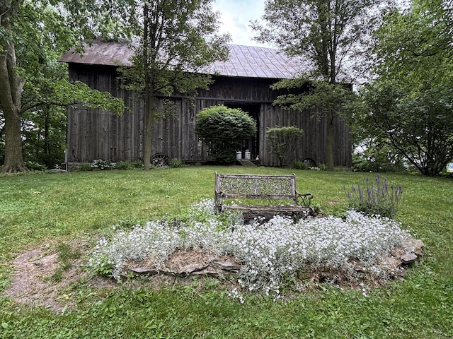 4602 State Route 273, Belle Center, OH 43310 - view of green lawn with an outbuilding