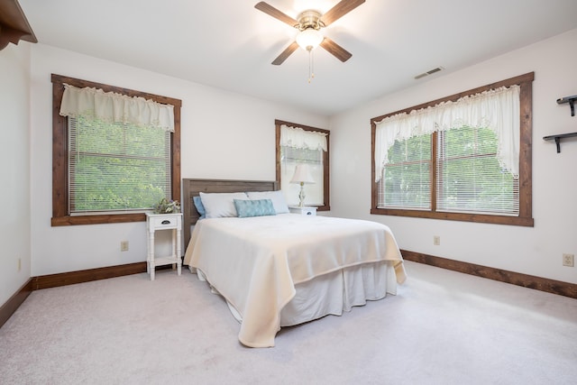 4602 State Route 273, Belle Center, OH 43310 - bedroom featuring light colored carpet, baseboards, and a ceiling fan