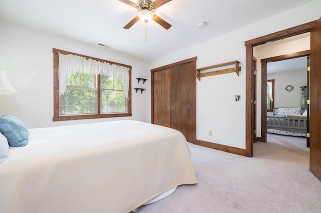4602 State Route 273, Belle Center, OH 43310 - bedroom featuring a closet, light carpet, baseboards, and a ceiling fan
